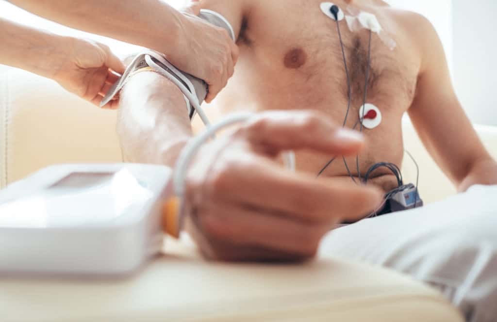 Patient being tested with Sphygmomanometer