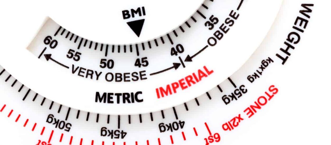 Simple BMI body mass index calculator meter tool, weight measurement, obesity problem abstract Measuring weight and calculating BMI Arrow pointing at very obese range Metric and imperial units display