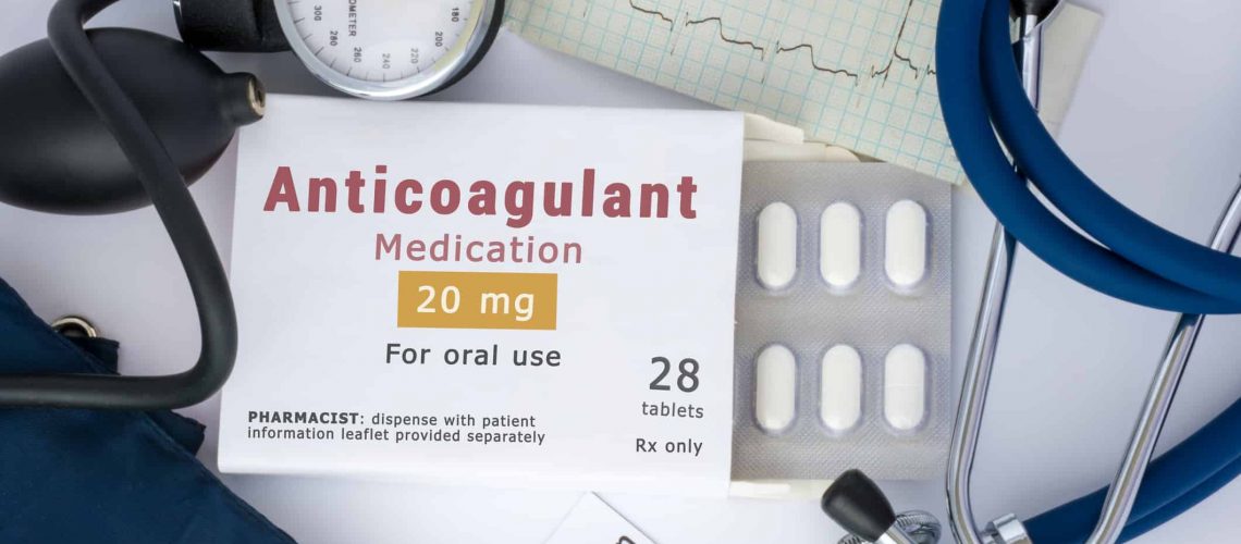 Anticoagulant drug for blood, for prevention or prophylaxis of vascular diseases of heart or brain. Packing of pills with inscription "Anticoagulant Medication" on table